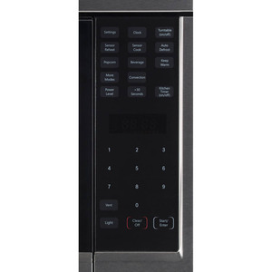 Four à micro-ondes à hotte intégrée SpaceMaker GE Profile de 1,8 pi3