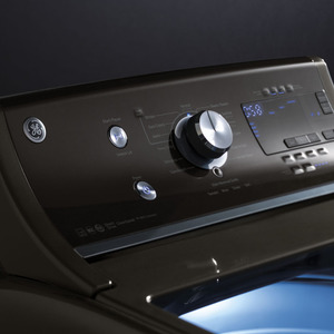 GE Energy Star Laveuse à chargement par le dessus de 5.9 pi. cu. Métallique GTW860SPJMC